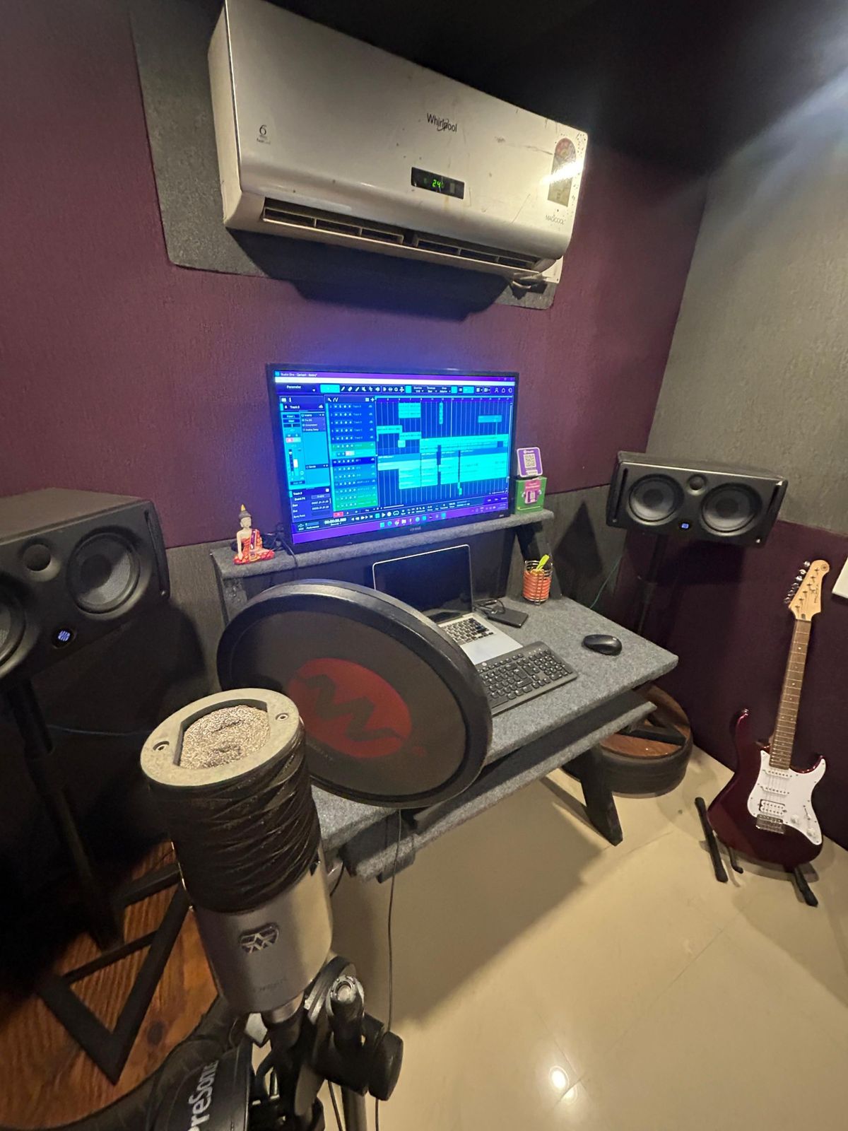 Control desk with monitors, microphone and guitar